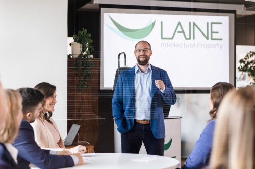 A man giving a training before audience